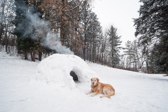 winter camping in a snow igloo