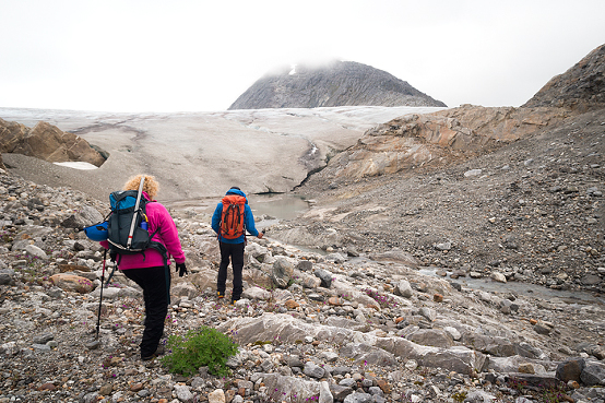 People hike across challenging terrain on a trekking adventure on Lemon Glacier, Juneau 