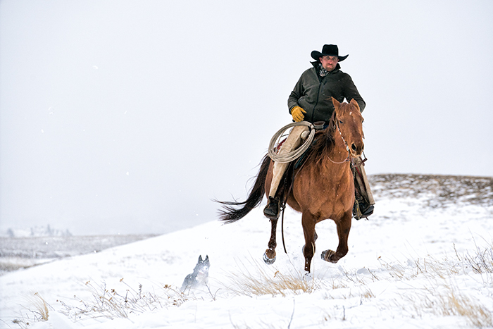 life-on-a-ranch-cowboy-culture-riding-snow