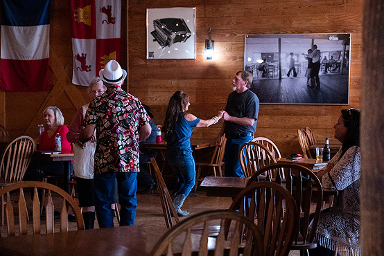Vermillionville Living Folk Museum, live Cajun music and dancing at Bal du Dimanche, Sunday Dance Series, Lafayette, Louisiana, USA