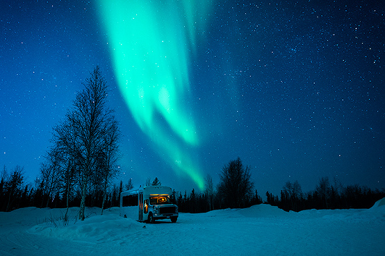 Aurora over a bus in Yellowknife