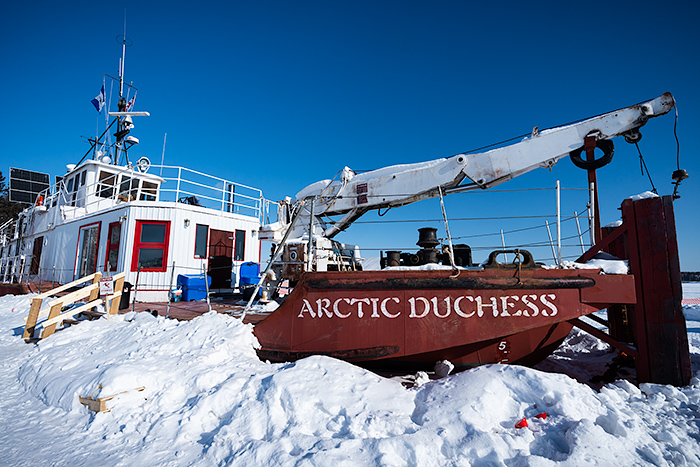 Coast guard ship moored in ice, Yellowknife